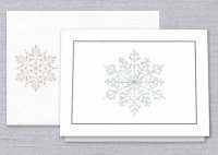 A shimmering and embossed snowflake is the star of this charming modern holiday card with a foil stamped silver border. Select from our greeting options on the inside, or create your own; choosing a font and ink color to match your style. The included envelope may be lined for an added touch of elegance.