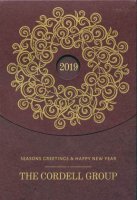 Please note that the year 2020 will be printed in the circle for order.

GILDED WISHES includes a modern design on the heavy Claret cardstock front with 2019 visible through the front circular window.  Personalize the inside with your holiday message and company name along the bottom.  Self sealing EasyStick envelopes are an optional upgrade along with envelope liners.
